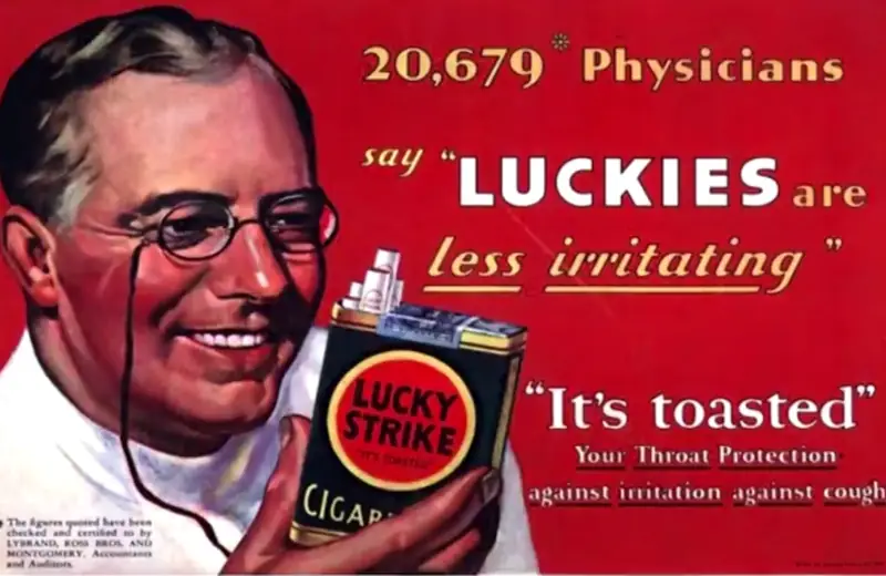 An old Lucky Strike cigarette advert featuring a man dressed as a doctor, smiling, and holding up a pack of cigarettes